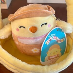Chick squishmallow in plush basket